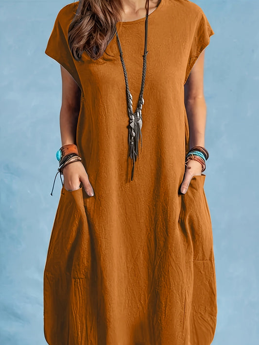 Elegante abito midi con maniche a pipistrello e tasche