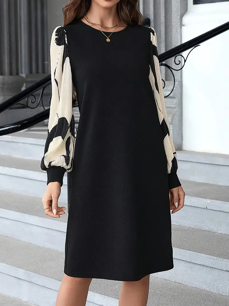 Abito elegante bicolore con maniche a lanterna