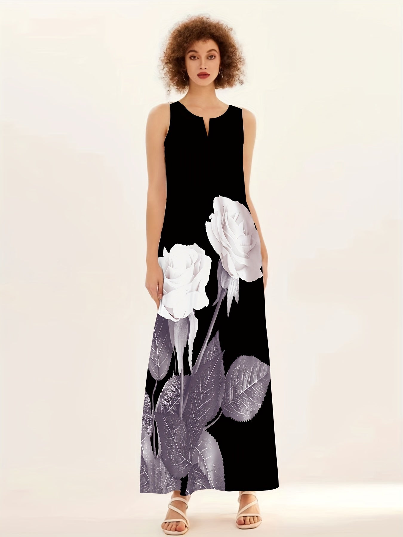 Maxi abito senza maniche con stampa floreale e scollo a intaglio