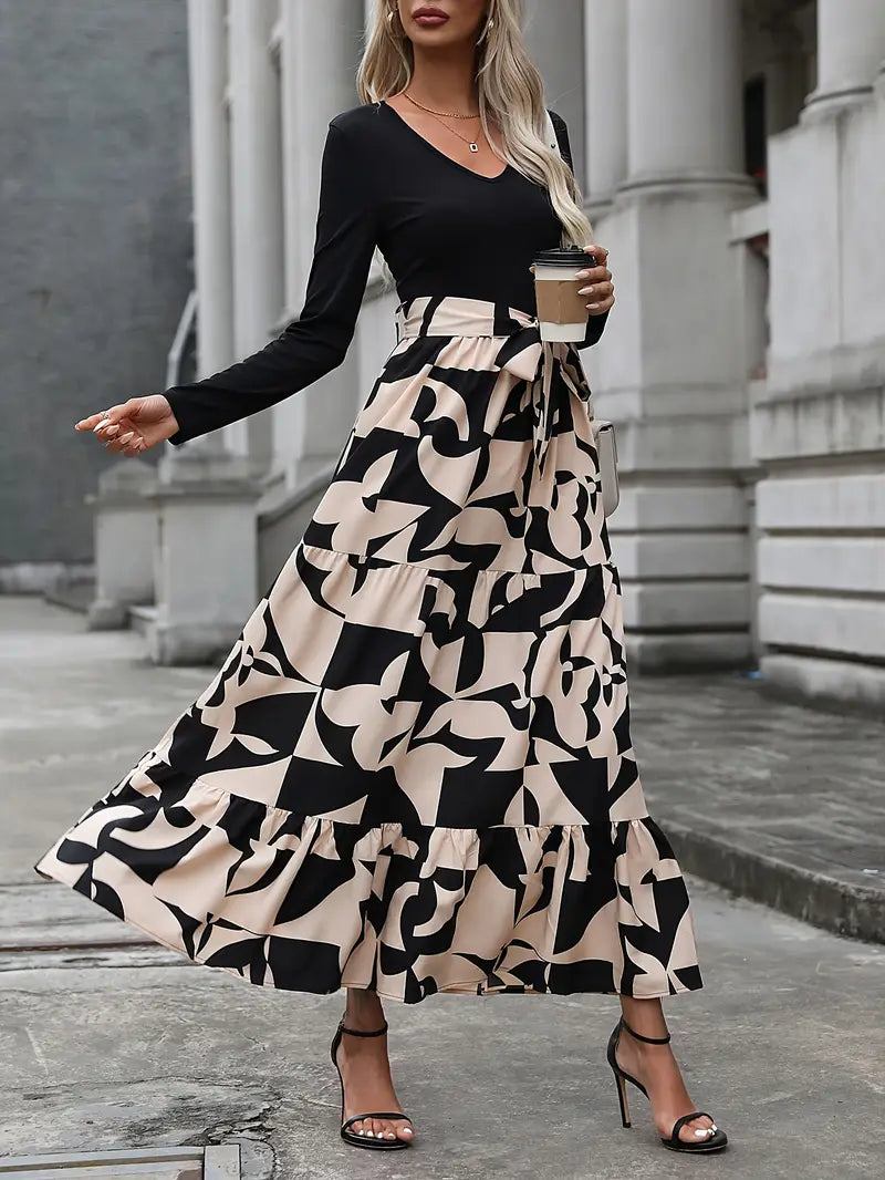 Elegante abito lungo a righe con scollo a V e maniche lunghe