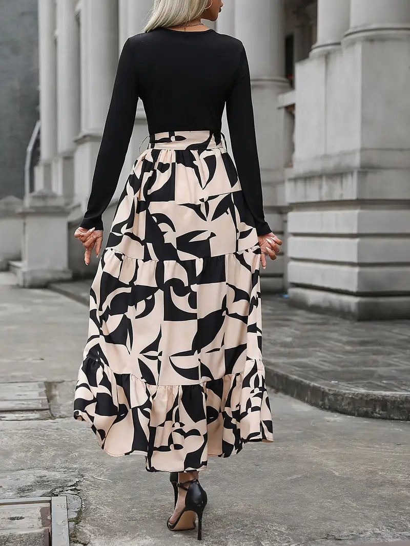 Elegante abito lungo a righe con scollo a V e maniche lunghe