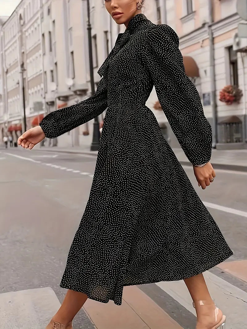 Elegante abito midi con maniche a lanterna e pois