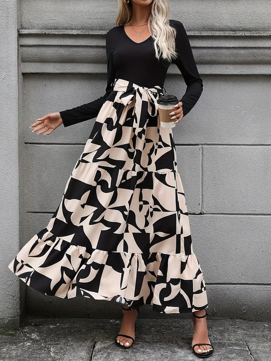 Elegante abito lungo a righe con scollo a V e maniche lunghe