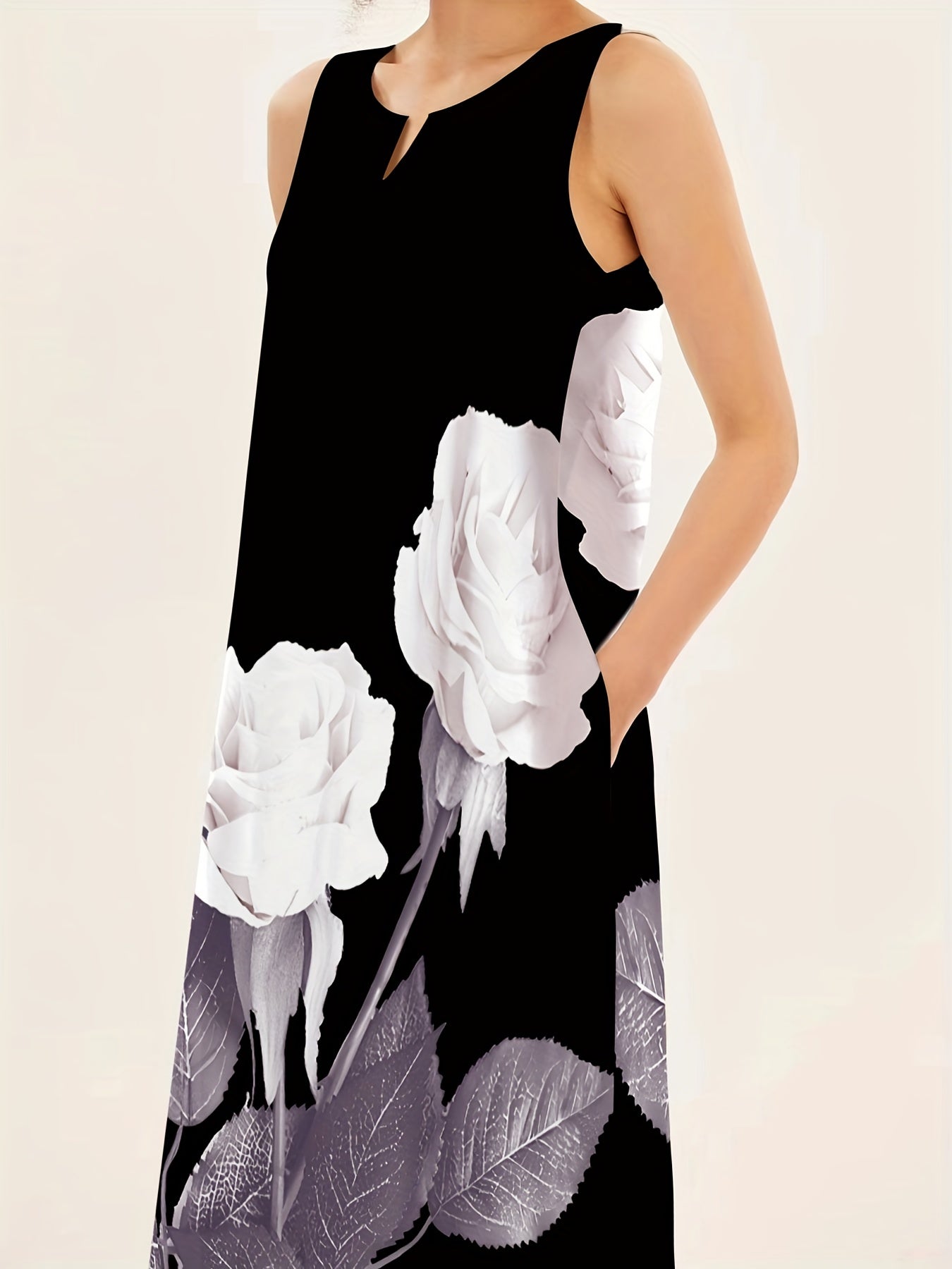 Maxi abito senza maniche con stampa floreale e scollo a intaglio