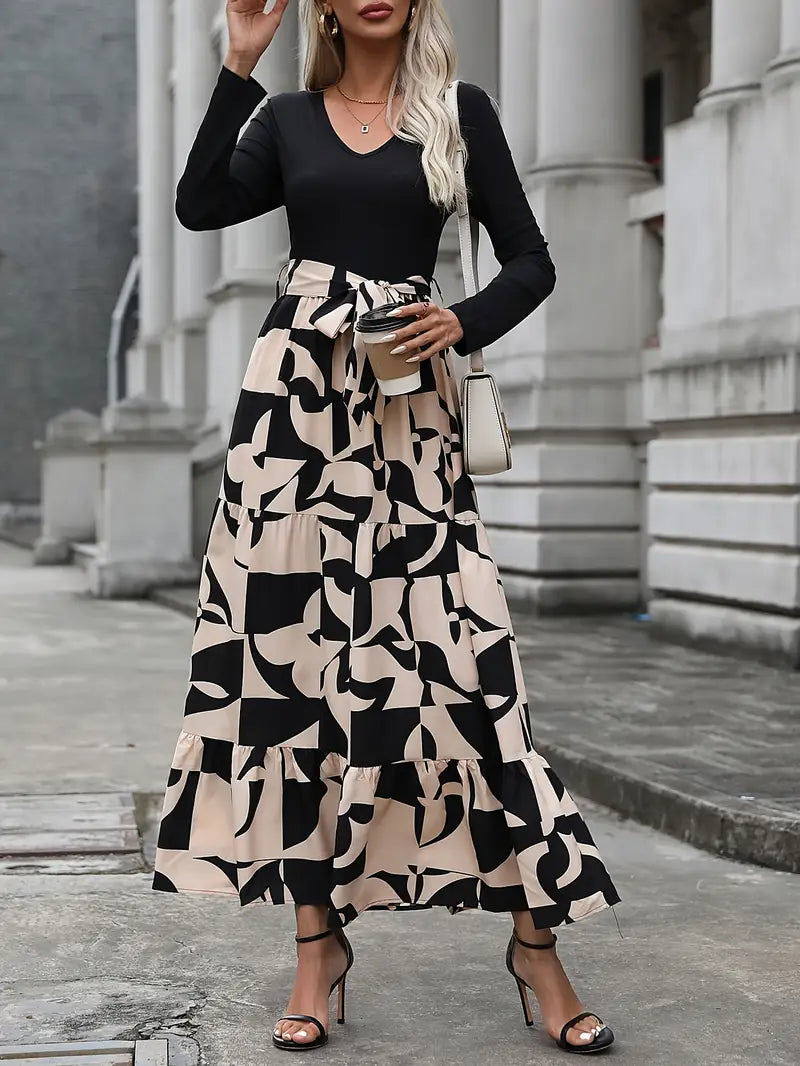 Elegante abito lungo a righe con scollo a V e maniche lunghe