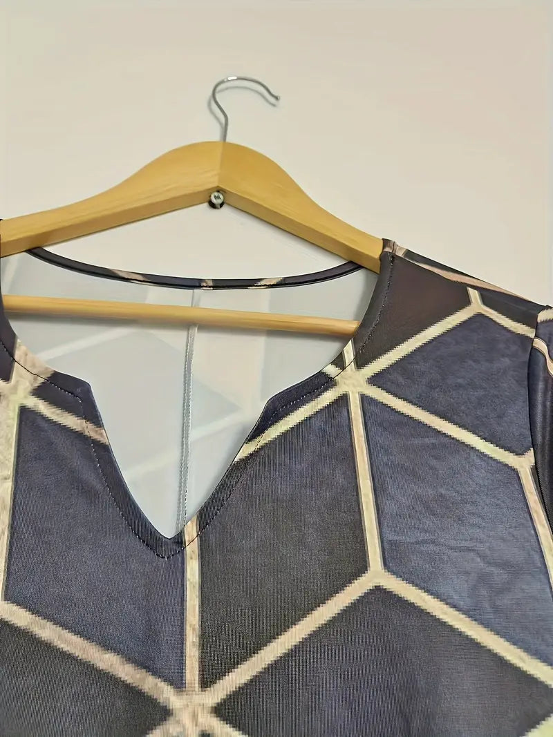 Elegante abito midi con blocchi di colore geometrici - Scollo a V