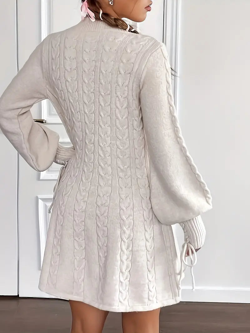 Confortevole e chic, l'abito in maglia a maniche lunghe con cavi