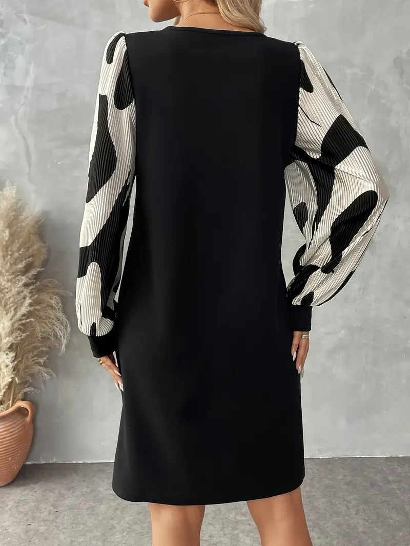 Abito elegante bicolore con maniche a lanterna