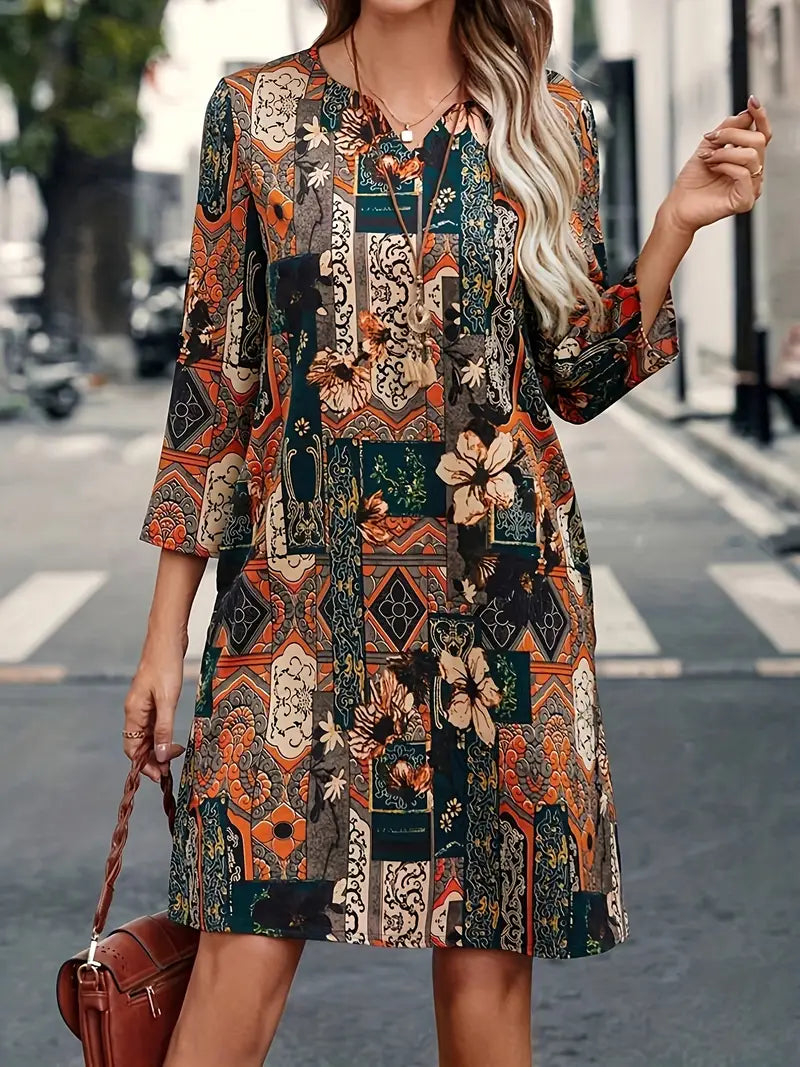 Abito floreale vintage con scollo a V e maniche a 3/4 da donna