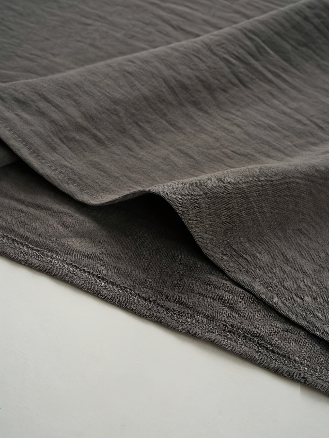 Elegante abito midi con maniche a pipistrello e tasche