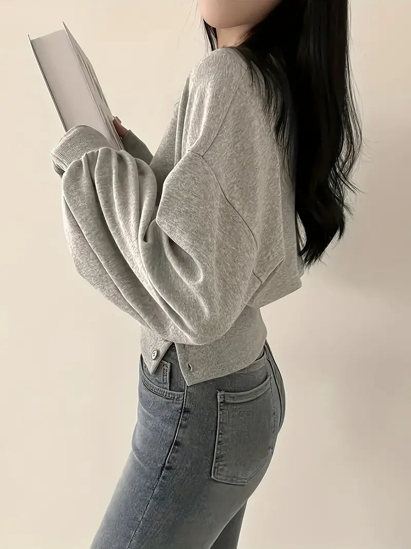 Elysia | Maglia crop in cotone con maniche a sbuffo e dettagli a bottoni